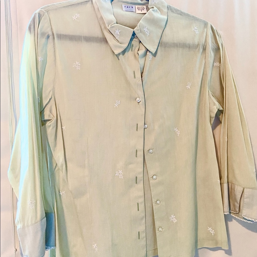 Pea green cotton voile shirt w embroidery design & details on cuffs/ collar.